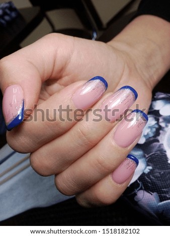stylish manicure in the French style, blue on a flesh background, with elements of silver ombre, as well as hardware manicure, handmade, new technology and beautiful design are combined in one photo, 