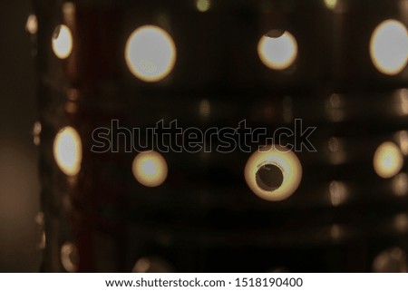 Close up picture of a lamp made from a can. DIY tendency. Do it yourself with everyday material..
