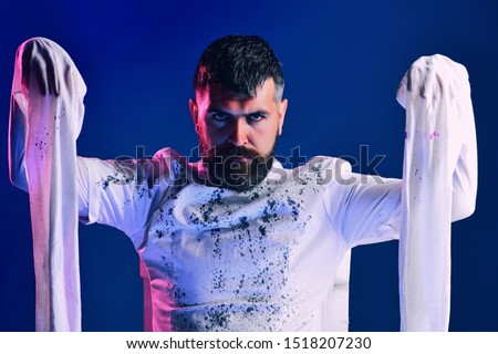 Holiday halloween with funny carnival costumes - straitjacket. Insane mad in straitjacket on blue background. 31 october. Make up and scary concept for man. Celebration party