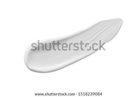 White cosmetic cream, body lotion, moisturiser swatch smear swipe. Skin care product smudge stroke isolated on white background. BB CC cream, makeup foundation texture Royalty-Free Stock Photo #1518239084