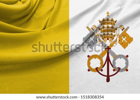 Realistic flag of Vatican city Holy see on the wavy surface of fabric