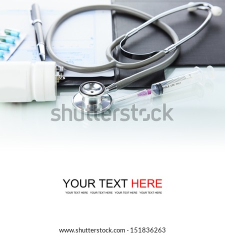 Stethoscope with black medical clipboard and medicine Royalty-Free Stock Photo #151836263