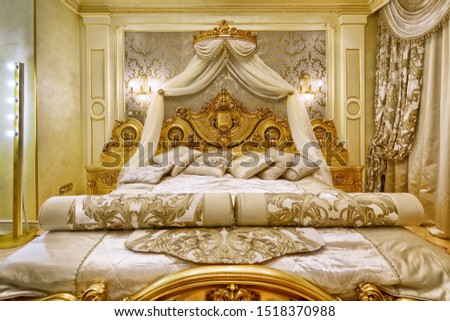luxurious  interior. Designer modern renovation in a luxury house. Stylish bedroom interior with double bed