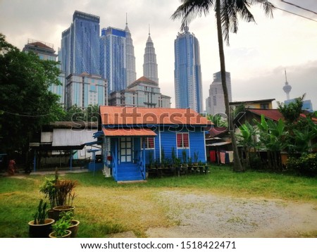 cultured village house in the middle of big Kuala Lumpur city