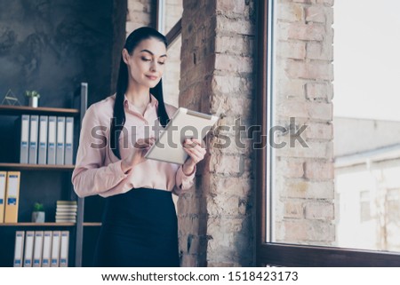 Low below angle view photo of beautiful cute attractive employer considering application for job in official site of her organization