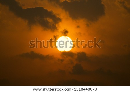 Bright sunset and clouds stock photo.