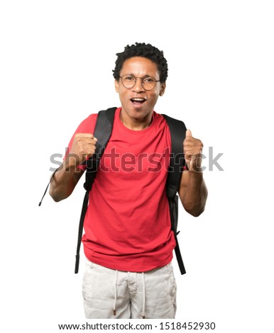Competitive young man making a gesture of celebration
