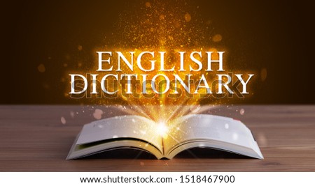 ENGLISH DICTIONARY inscription coming out from an open book, educational concept