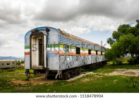 abandoned train car in countryside