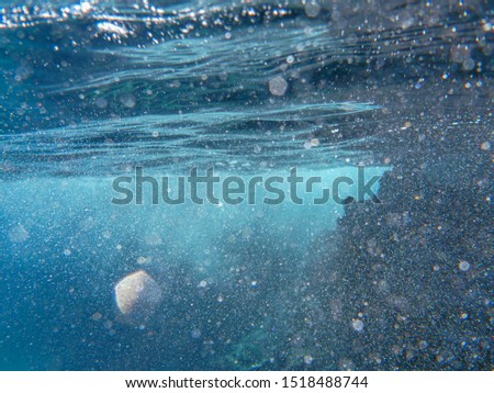 Abstract background of underwater in the Aponissos beach, Agistri island, Saronic Gulf, Attica, Greece.