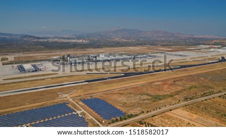 Aerial photo taken from inside an aircraft of modern Athens International airport - Eleftherios Venizelos, Attica, Greece