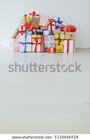 Christmas birthday gifts in the interior of the white room