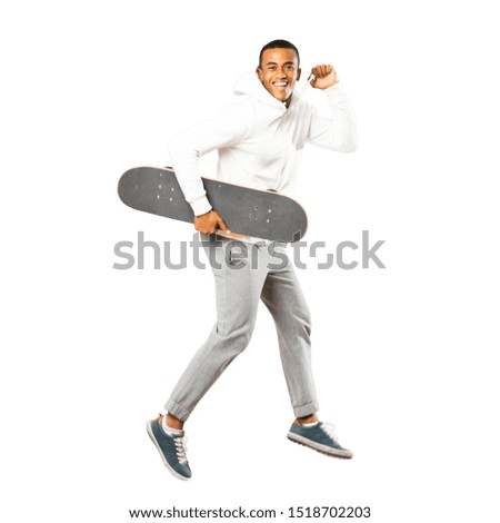 Full-length shot of Afro American skater man over isolated white background