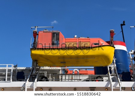 Picture of a rescue boat on board a cruise ship. Mandatory safety equipment for passenger vessels.