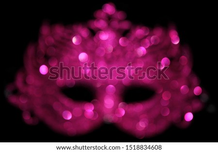 Blurred Pink Carnival Mask Bokeh Background