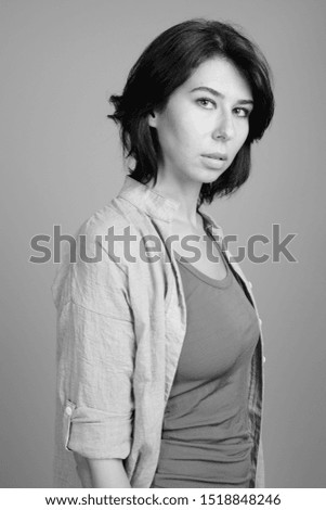 Portrait of young beautiful woman shot in black and white