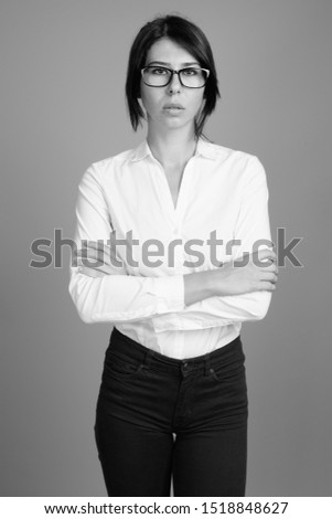 Portrait of young beautiful businesswoman shot in black and white