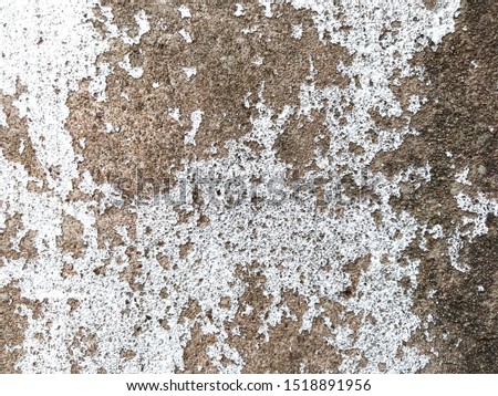 White color peeling on concrete wall look dirty suitable for background 