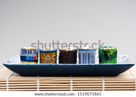 Sushi Wrapped in Plastic, Ocean Pollution Conceptual Image. Copy Space Poster.