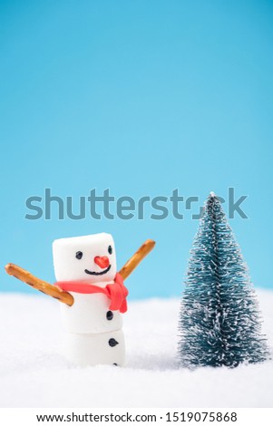 Happy Funny Snowman Play in Snow by Christmas Tree.