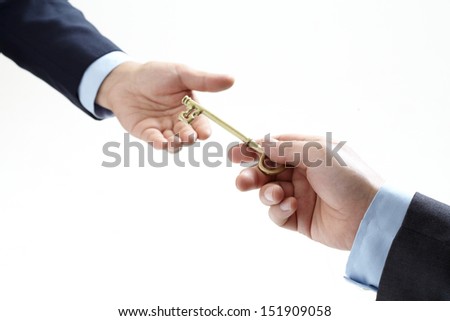 hand holding key on isolated on white background