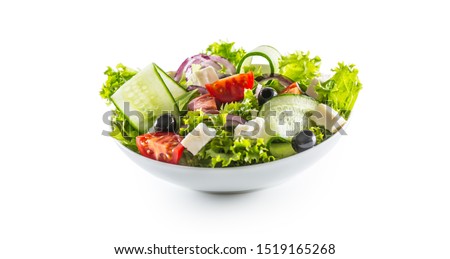 Salad with fresh vegetables olives tomatoes red onion greek cheese feta and olive oil isolated on white background. Royalty-Free Stock Photo #1519165268