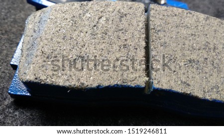 picture of ceramic break bads used in front wheels of a front wheel drive car