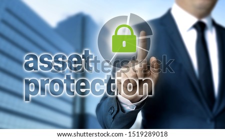 Asset Protection concept is shown by businessman. Royalty-Free Stock Photo #1519289018