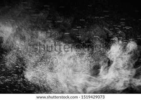 White powder explosion on black background. Colored cloud. Colorful dust explode. Paint Holi. 