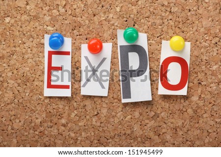 The word Expo in cut out magazine letters on a cork notice board. Expo is the acronym for exhibition, usually a large fair or promotion by business and industry to market their goods and services.