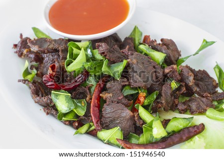 Thai deep fried marinated beef with chilli sauce