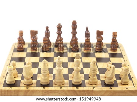 wooden chess pieces on white background