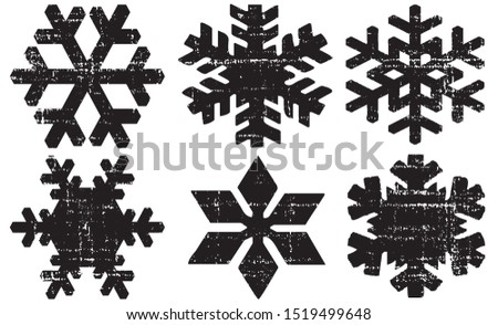 Grunge Textured Snowflakes Collection. Can be used as Banners, Insignias or Badges. Vector Distressed Texture Set. Blank Geometric Shapes. Vector Illustration. Black isolated on white. EPS10.