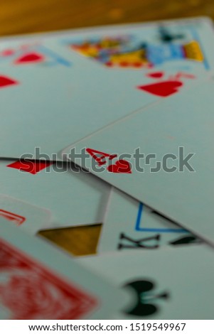 
Poker cards on wooden table