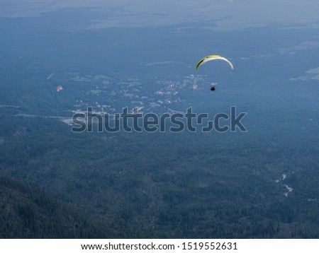 Exreme sport paragliding in High Tatras mountains. High Tatras, Slovakia.