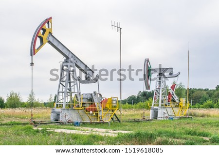 Oil pump at background for design. Oil rig energy industrial machine for petroleum  