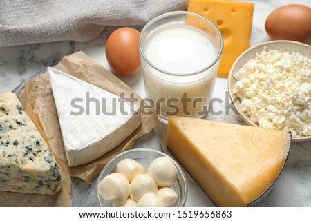 Different delicious dairy products on table, closeup Royalty-Free Stock Photo #1519656863