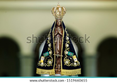 Statue of the image of Our Lady of Aparecida, mother of God in the Catholic religion, patroness of Brazil Royalty-Free Stock Photo #1519660655