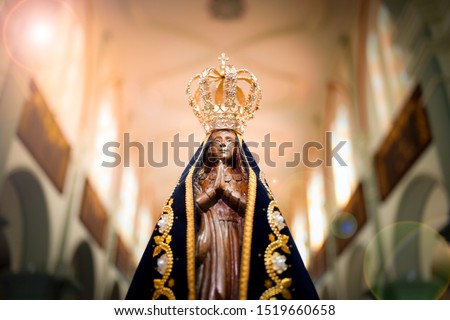 Statue of the image of Our Lady of Aparecida, mother of God in the Catholic religion, patroness of Brazil Royalty-Free Stock Photo #1519660658
