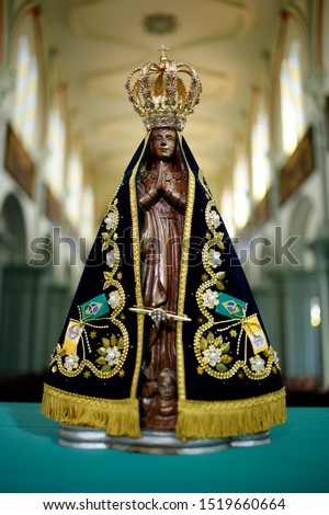 Statue of the image of Our Lady of Aparecida, mother of God in the Catholic religion, patroness of Brazil Royalty-Free Stock Photo #1519660664