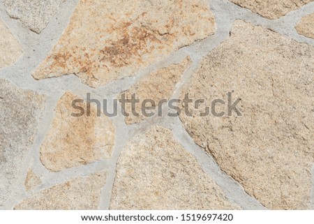 Pavement in natural stones in a garden
