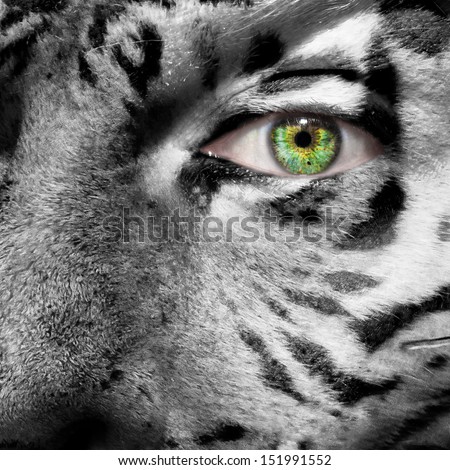 Siberian Tiger face superimposed on a human face with a green eye to create awareness for this endangered species