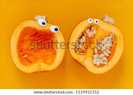 funny pumpkin family on the orange background