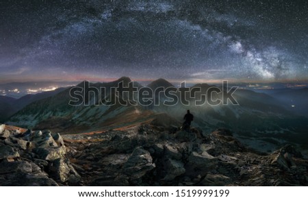 Tatras mountain panorama at night with milky way, Slovakia from peak Hruba Kopa in Rohace