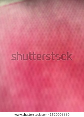 Pink blotched textured background or backdrop
