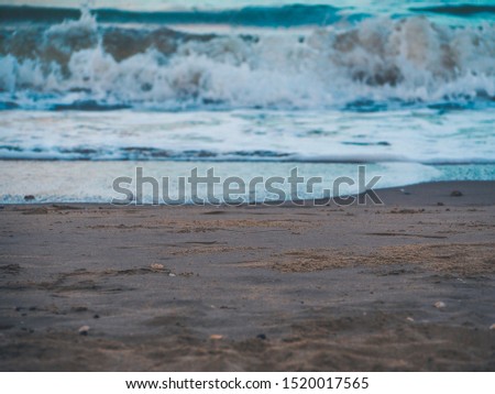 sea wave foam blue sea sand sunset time