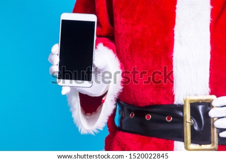 Santa Claus with his cell phone