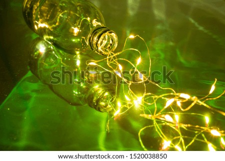 Flowing lights from the bottle. Abstract blur flow lights background. Bokeh lights. Studio shot of the flowing lights.