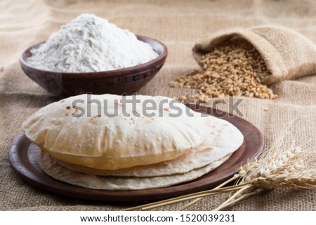 Indian Roti, chapati, poli, which is made of organic wheat.  Royalty-Free Stock Photo #1520039231