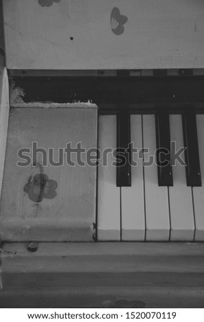 Black and white closeup of piano